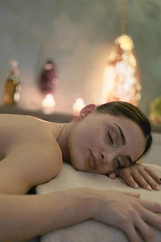 Client in a massage room at Padmalaya Center for massage and specialized therapies